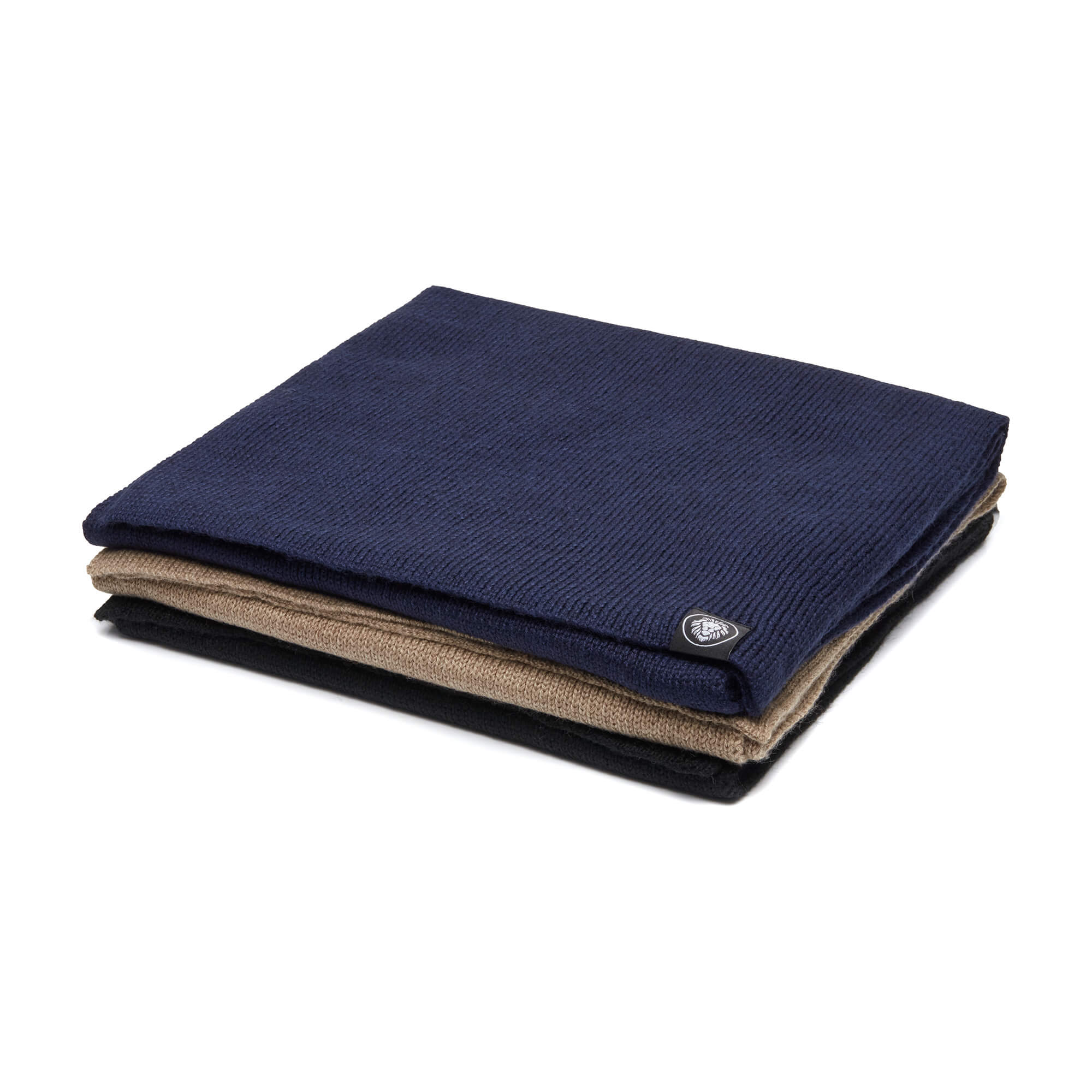 Three folded merino scarves.