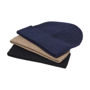 Three wool knitted hats in pile
