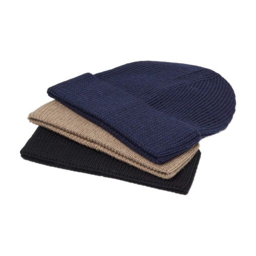 Three wool knitted hats in pile